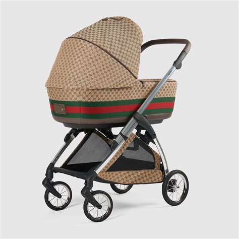 Gucci Stroller in beige and ebony GG canvas.